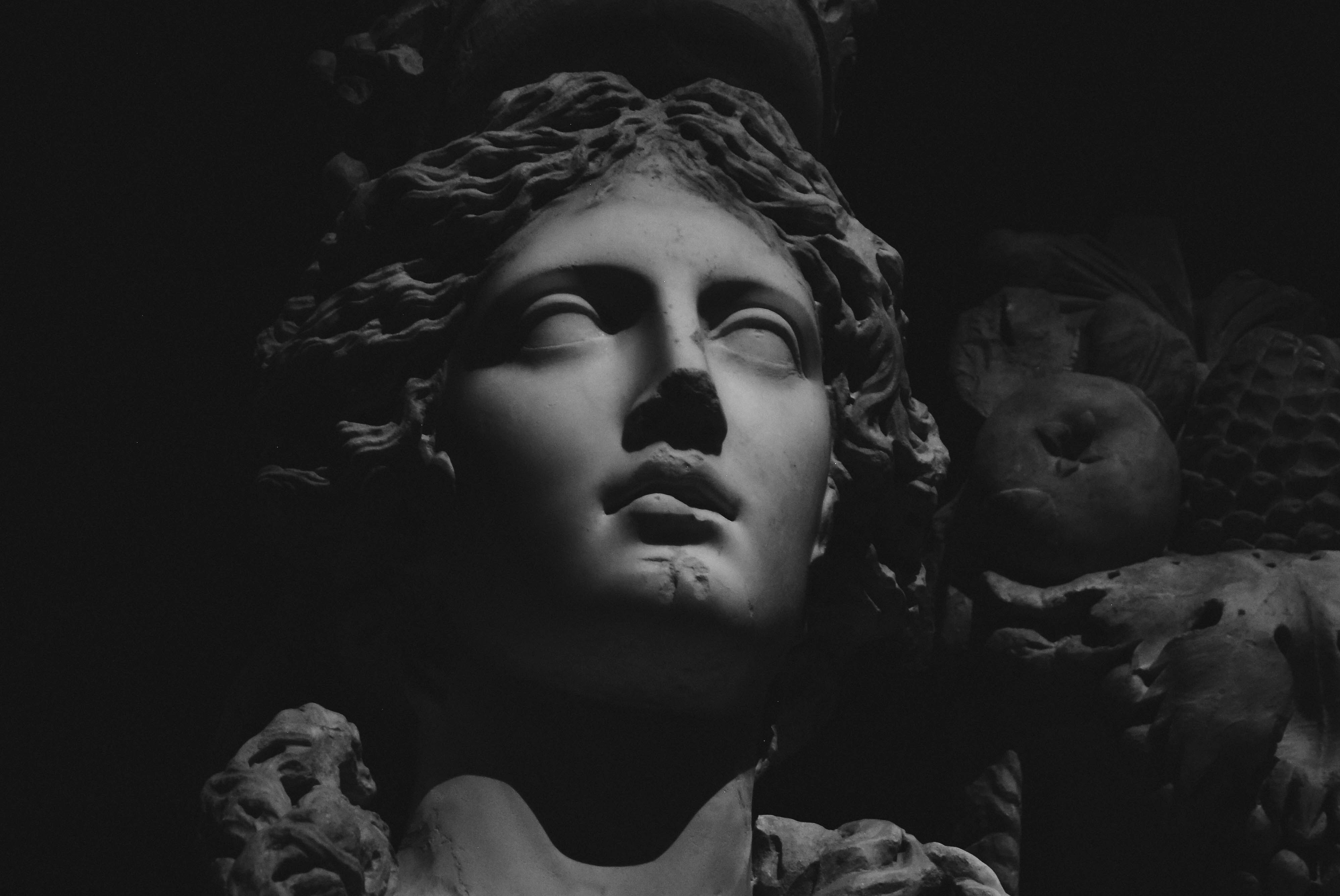 shadowy black and white image of statue of athena