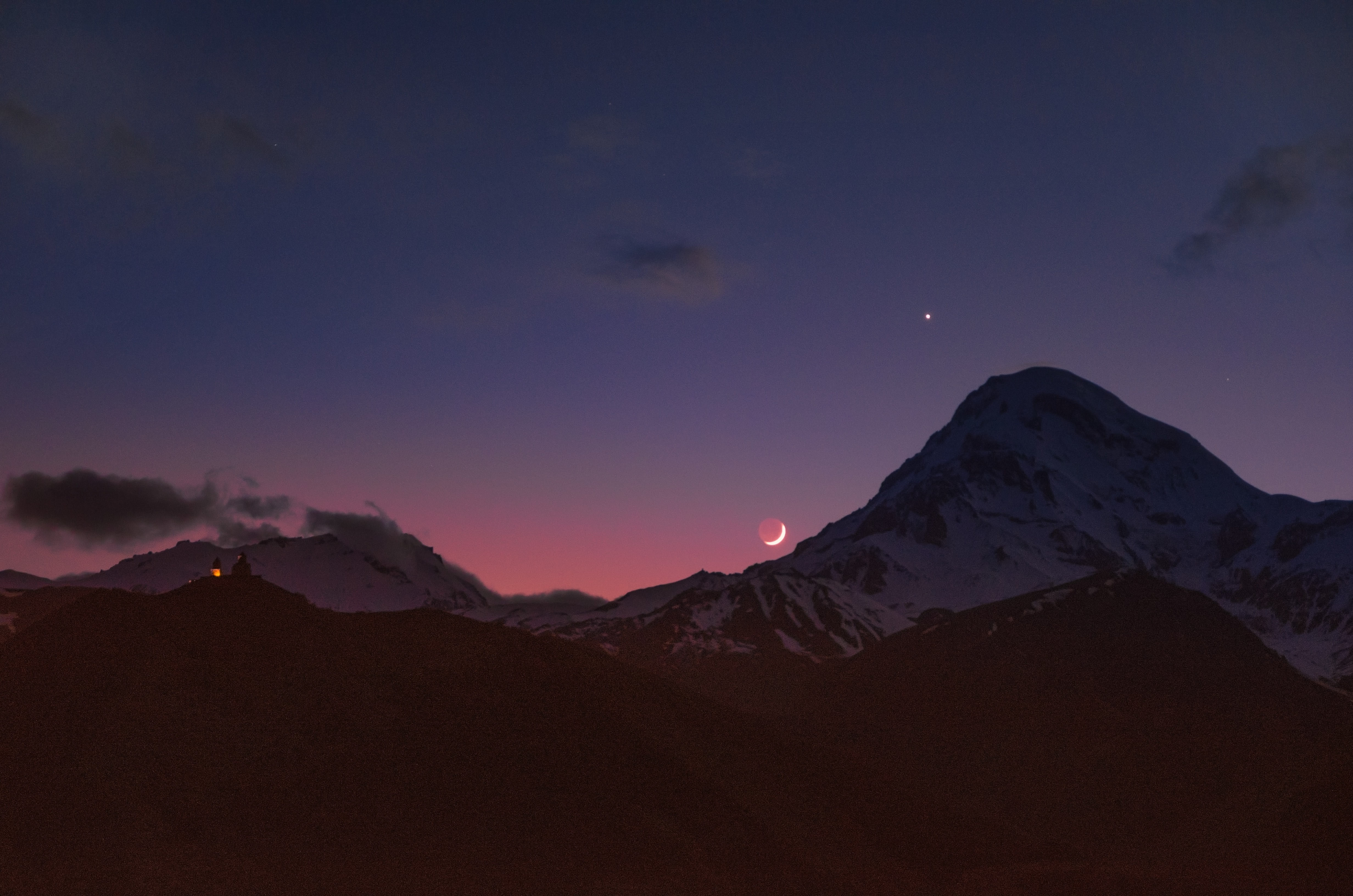 moon and star over mountains