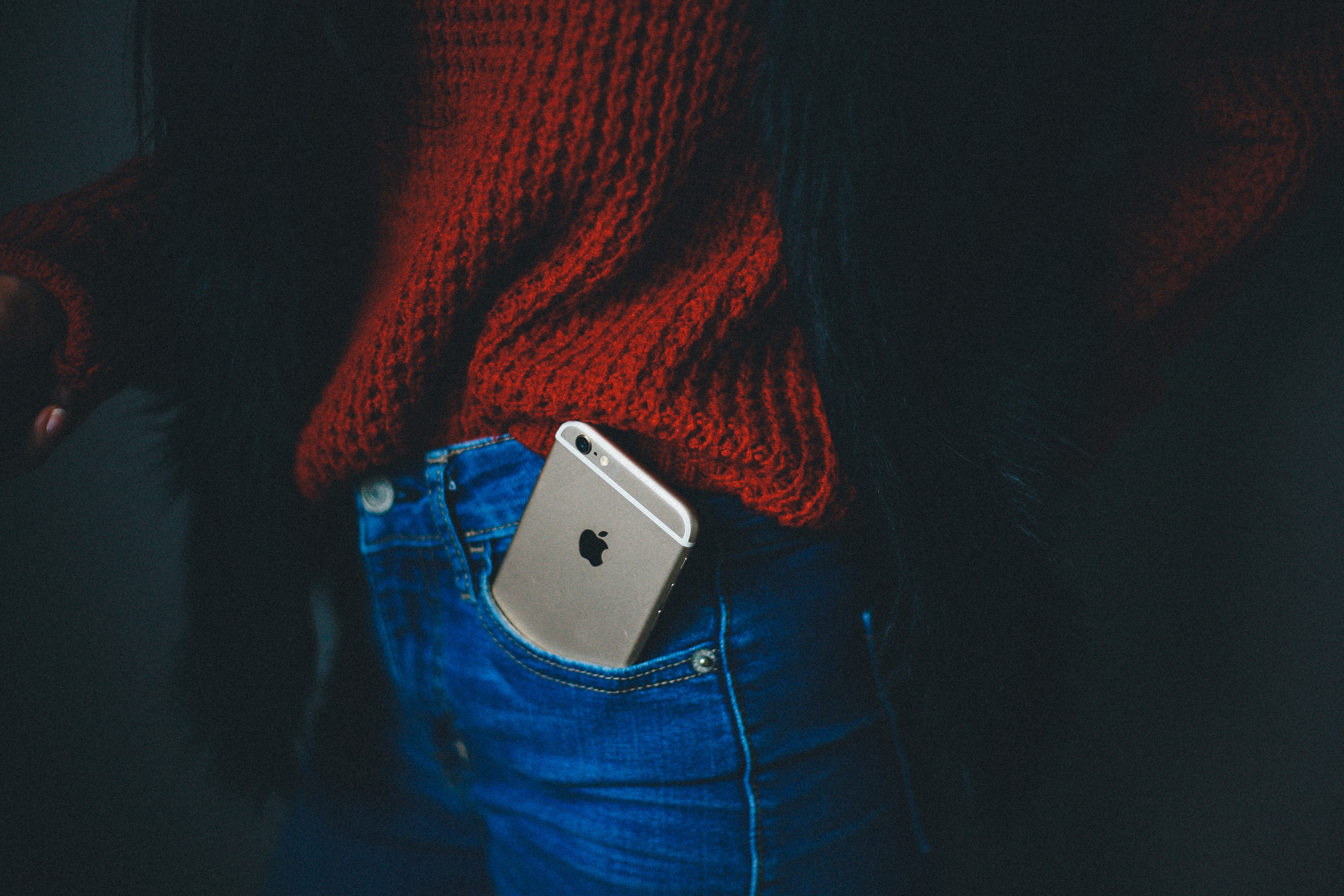 cell phone in woman's pocket