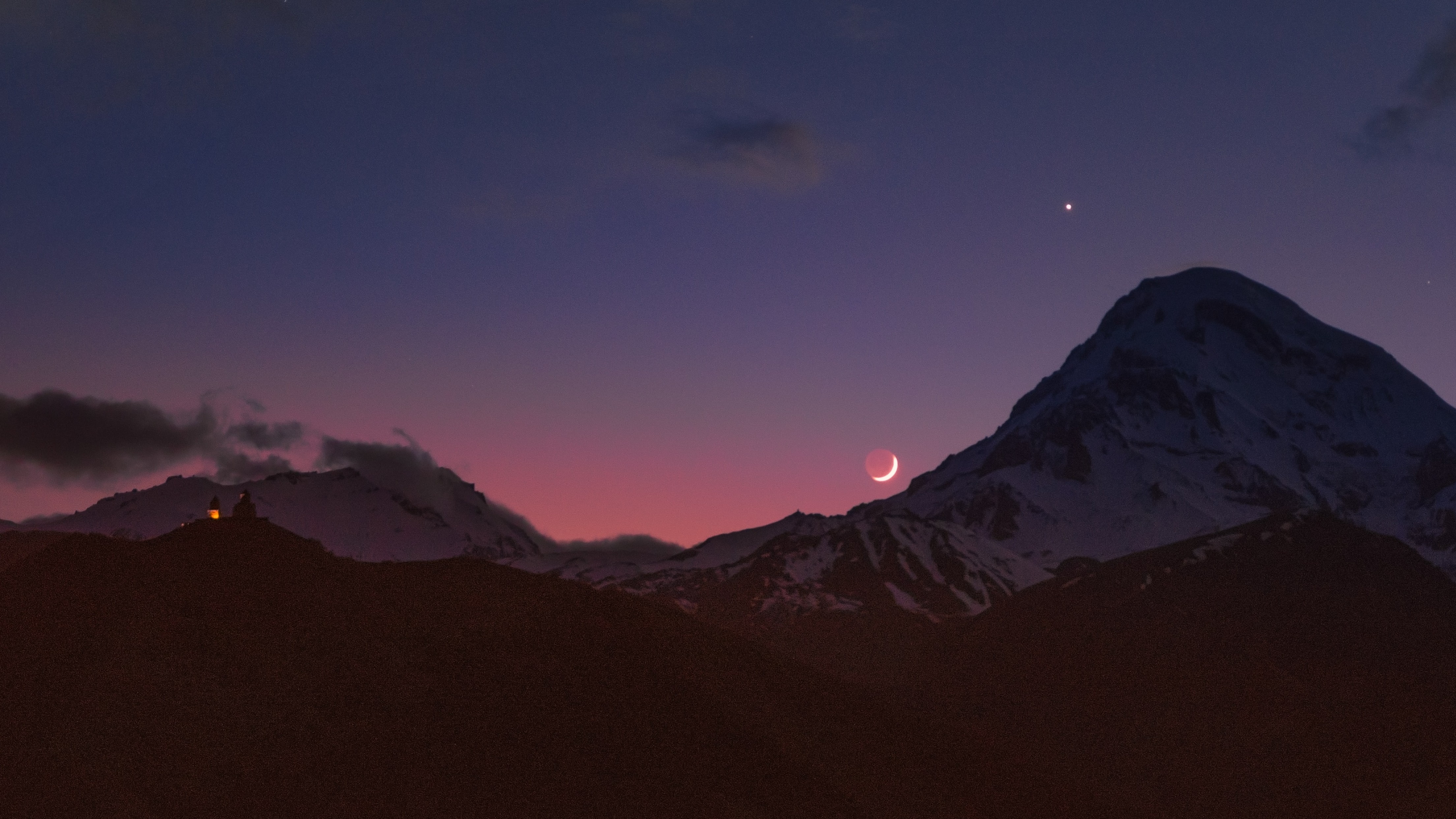 moon and star over mountains
