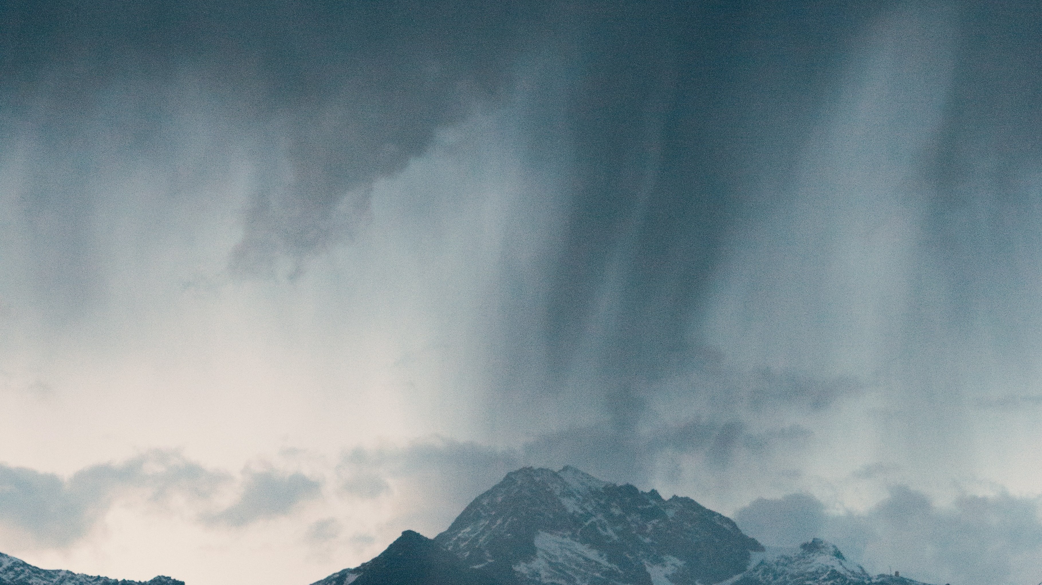 rain clouds over mountains