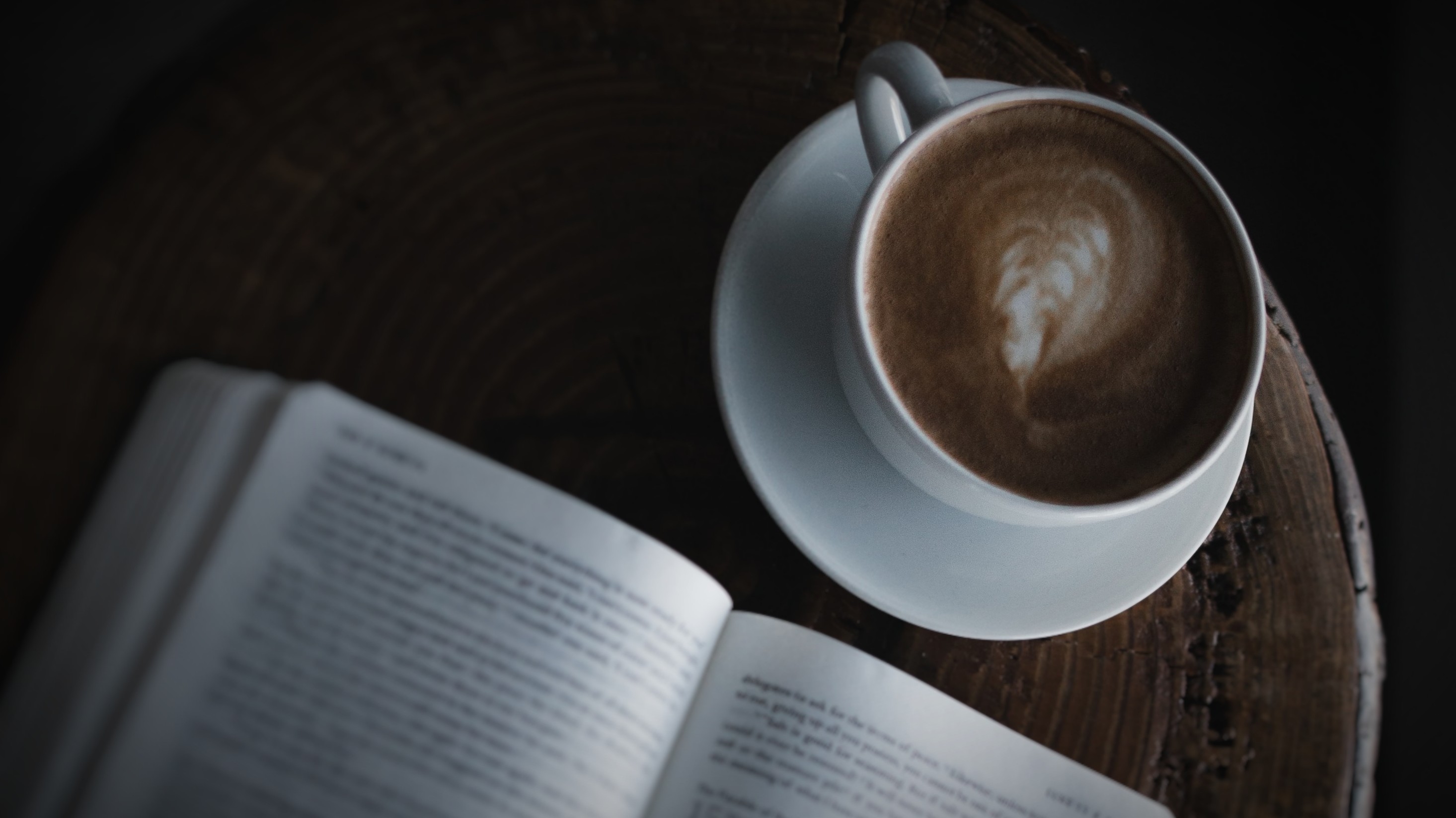coffee cup and open book