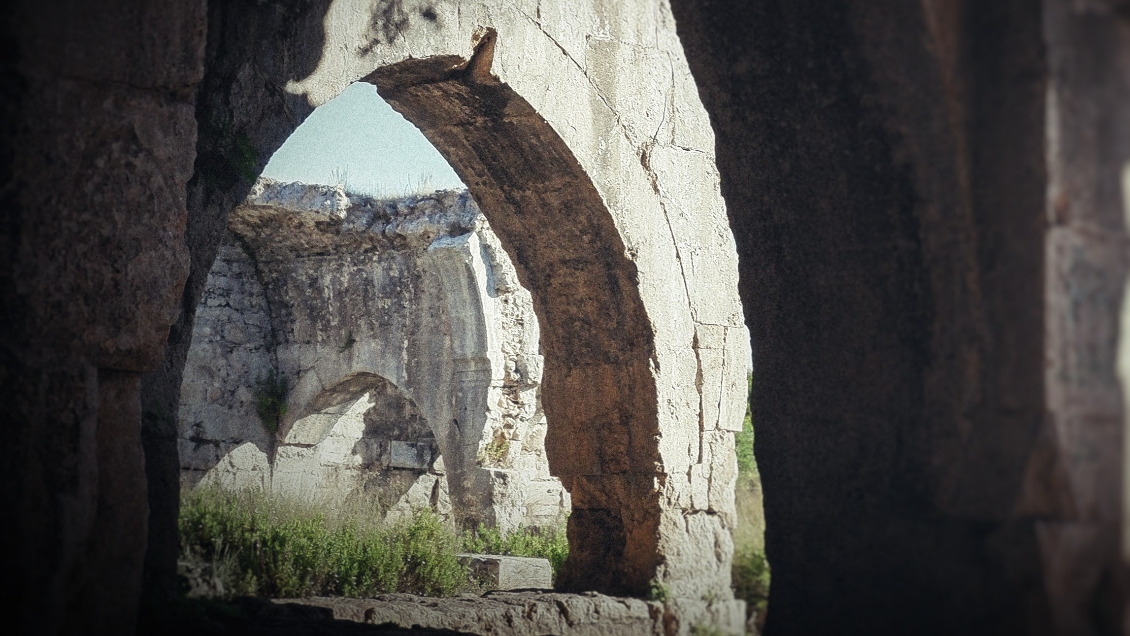 stone arches in sunlight