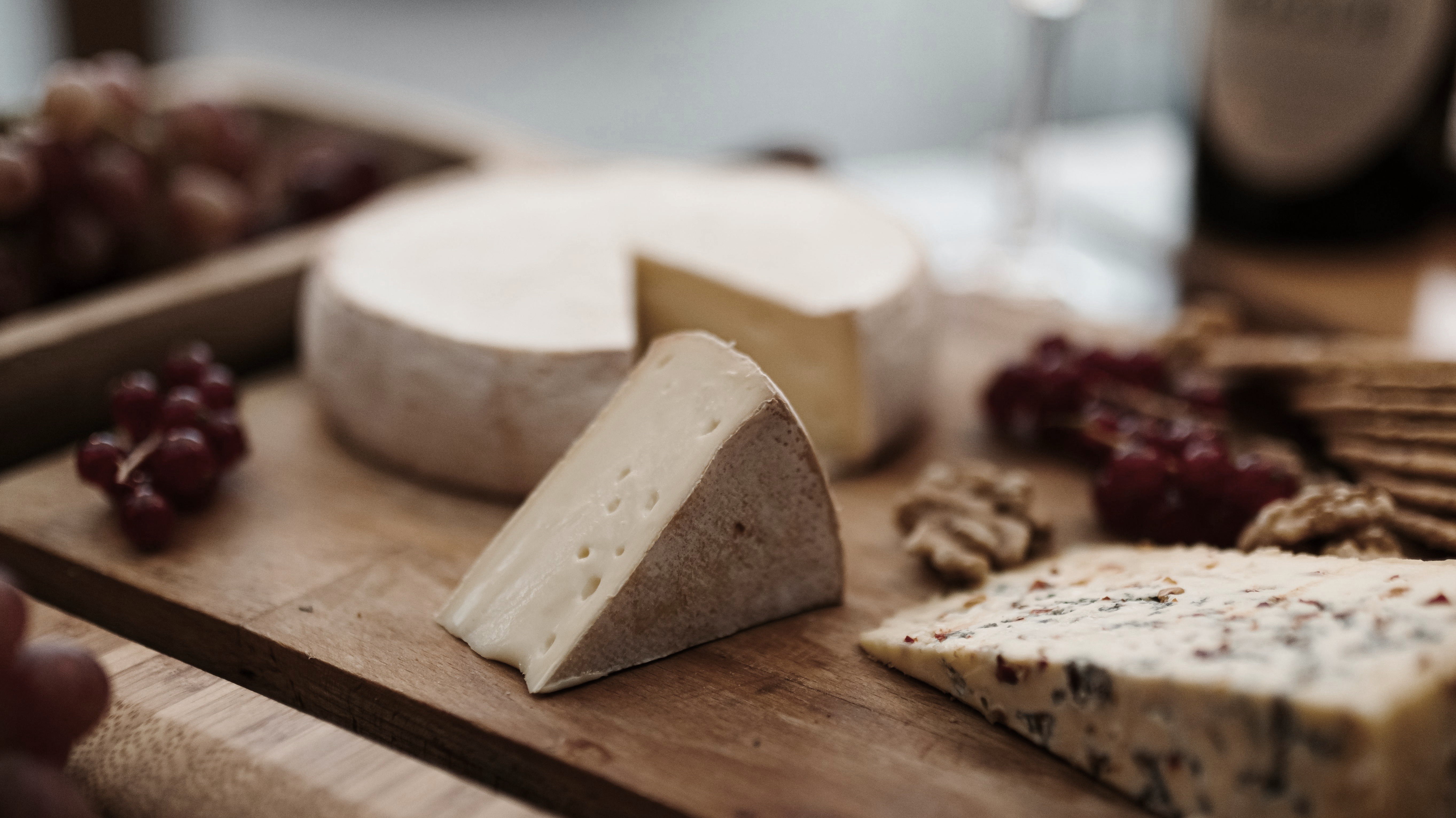 close-up of cheese wheels