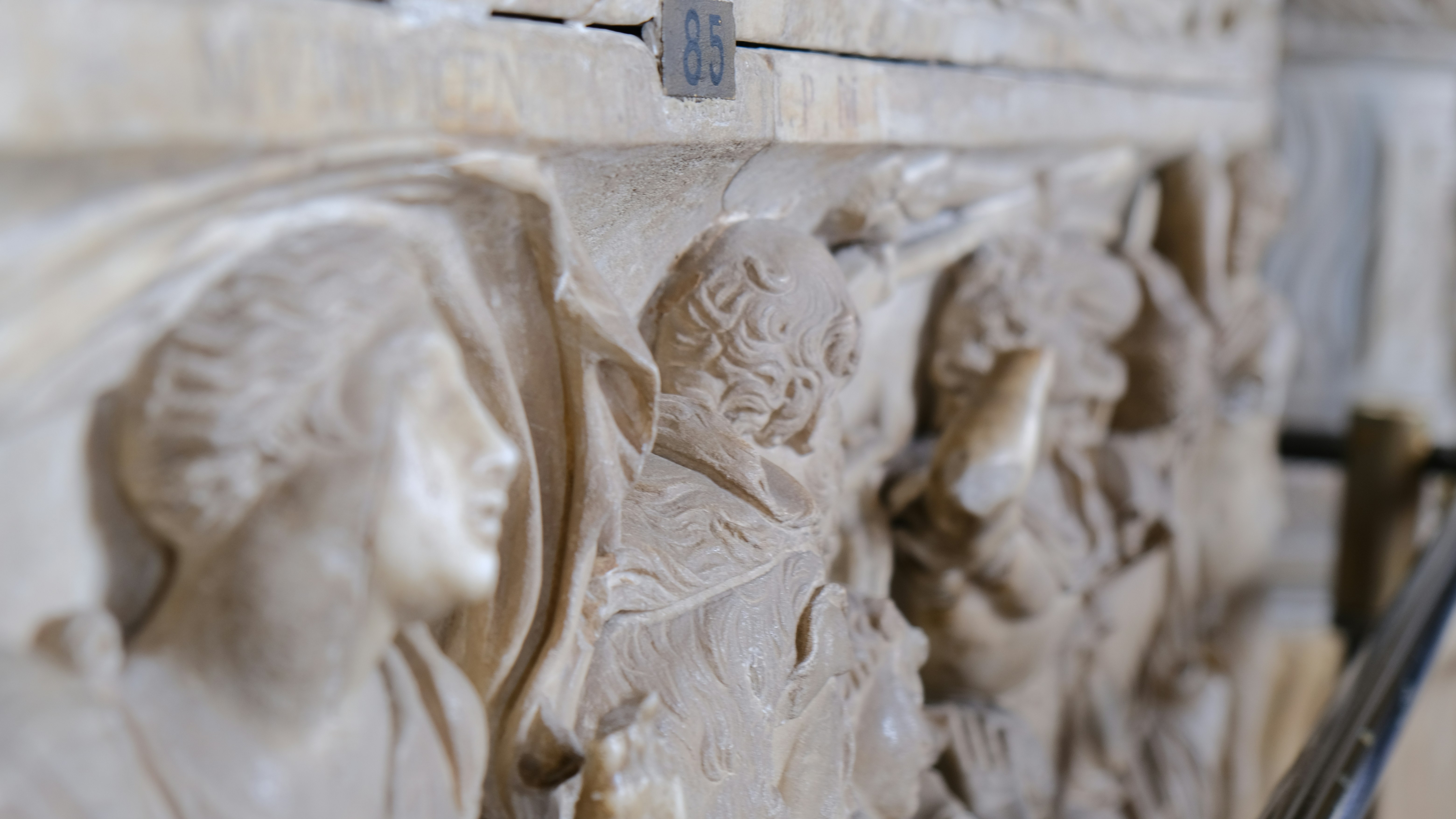 stone people in a row