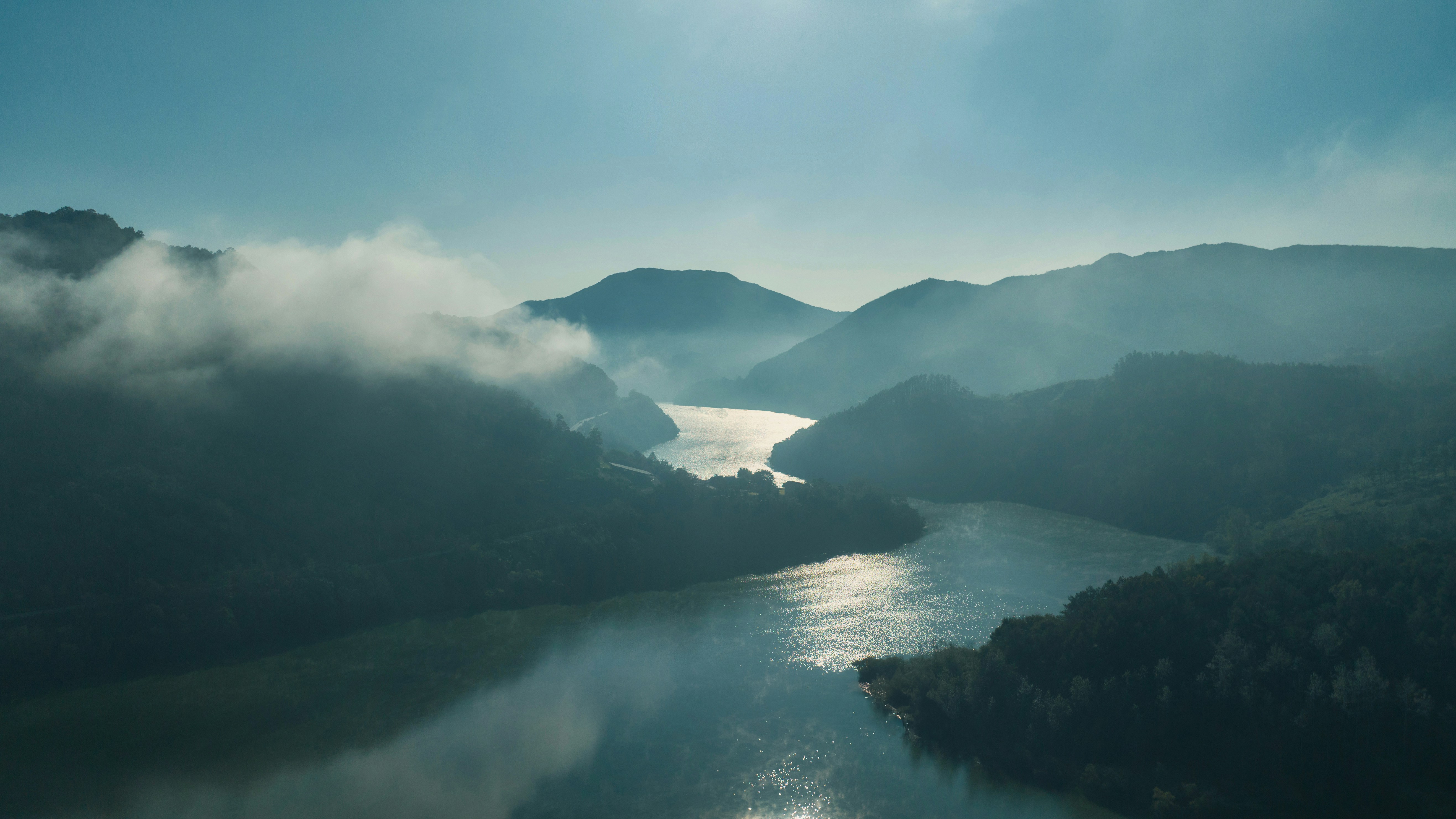 river curling through mountains